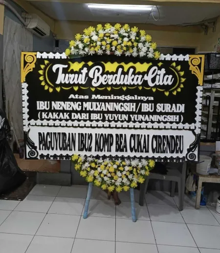 Papan Bunga Duka Tengah